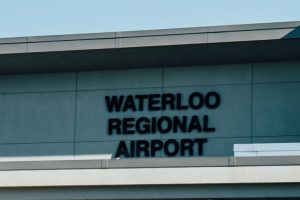 A picture of the outside building of the Waterloo Regional Airport.